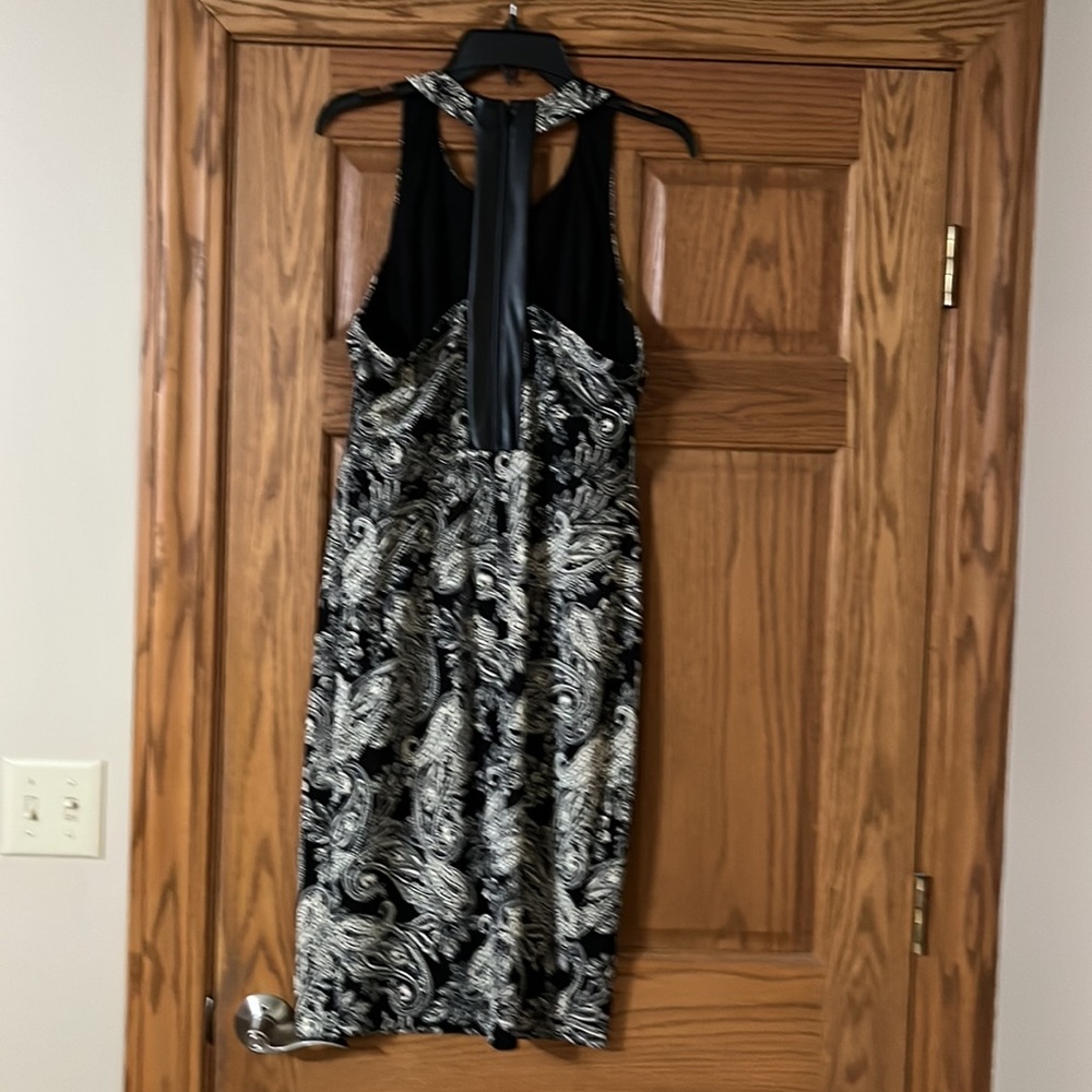Beautiful, black and cream dress with leather, like detail on the back - Picture 4 of 7